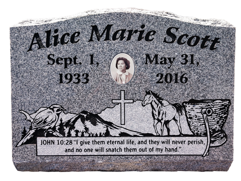 Custom memorial with a nature scene engraving and a picture of the women in the center