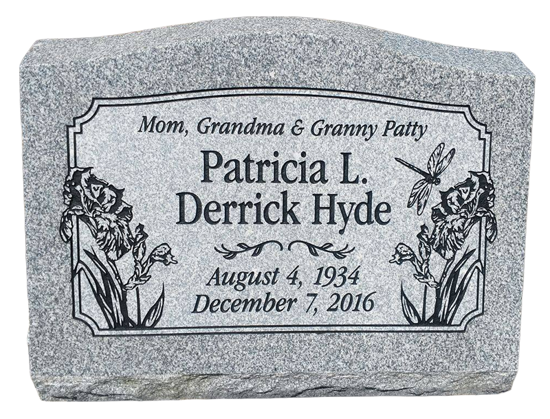 custom headstone with flowers engraved on it